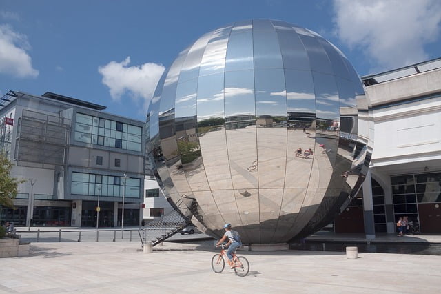 Bristol planetarium with someone on a bicycle Image by donations welcome from Pixabay 