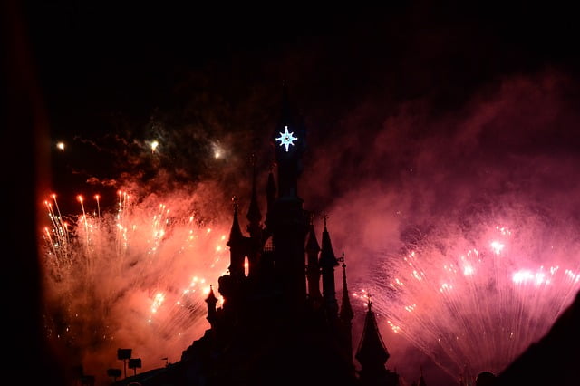 Disneyland castle in Paris, France during fireworks Image by Lisa Bunzel from Pixabay 