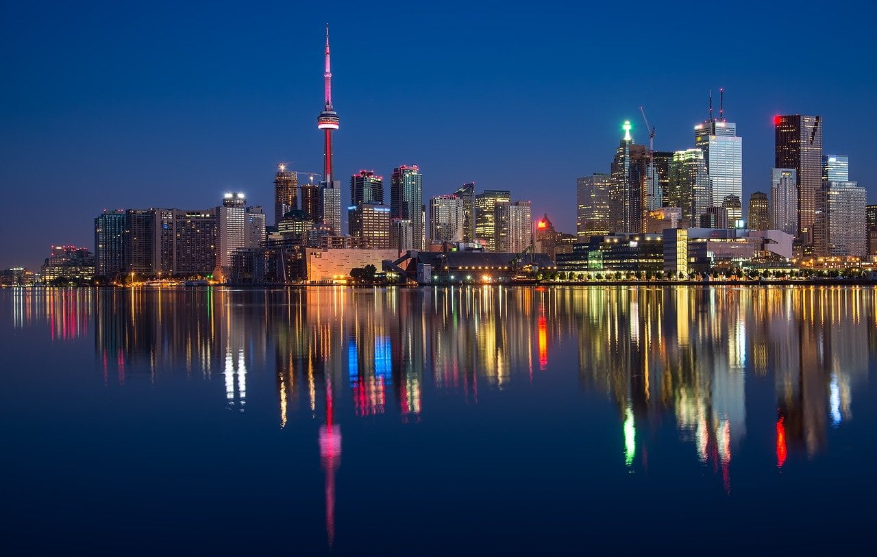 Toronto CN tower lights during blue hour by pixabay user jameswheeler
